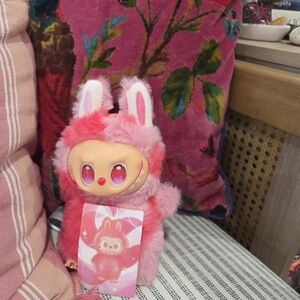 Pink and White Stuffed Animal Toy